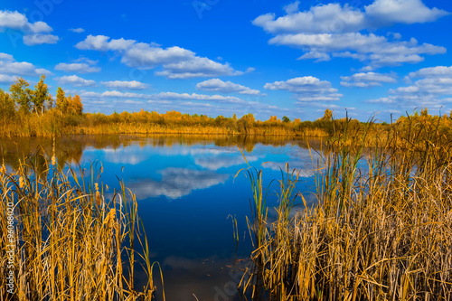 Fototapeta Naklejka Na Ścianę i Meble -  small blue lake among a prairies