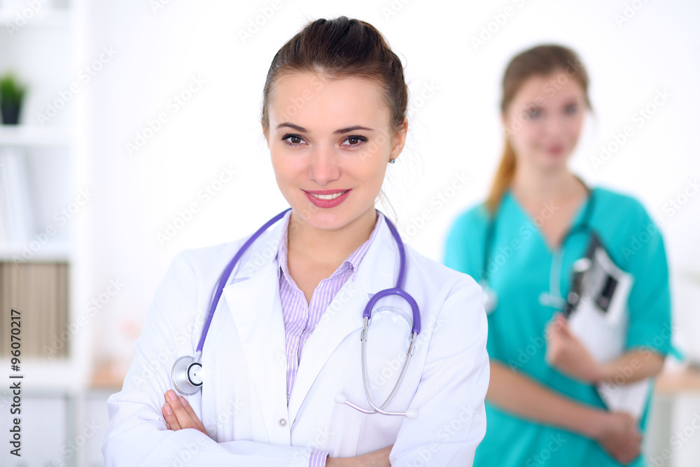 Portrait of young female doctor in a hospital Portrait of young female doctor in a hospital