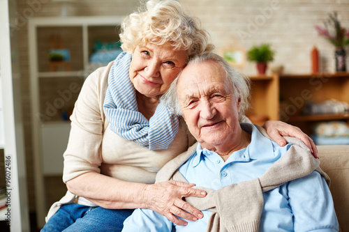 Affectionate elderly couple photo