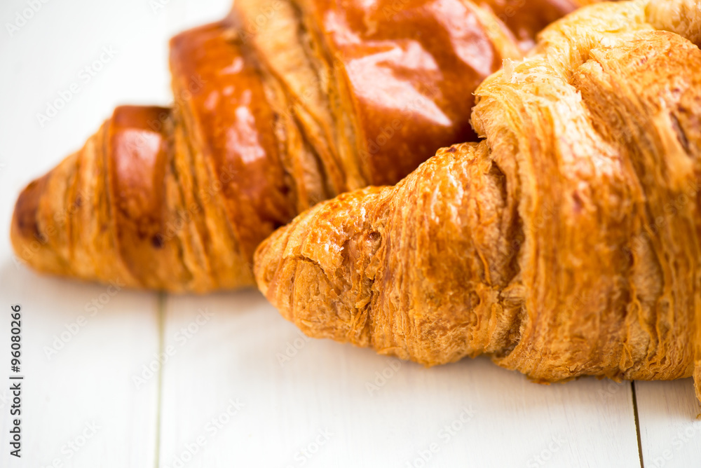 Two Fresh Croissants are ready for the Breakfast Two Fresh Croissants are ready for the Breakfast
