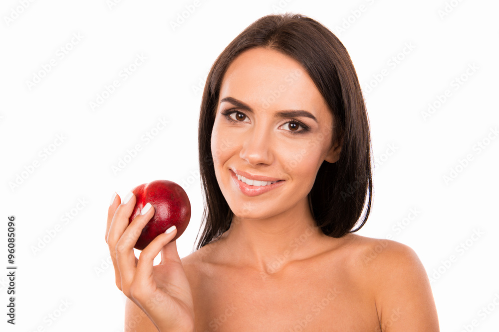 Beautiful healthy girl holding a nectarine Beautiful healthy girl holding a nectarine