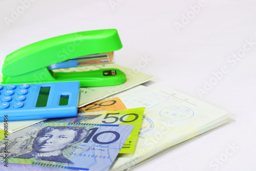 Calculator and stapler and Australian Dollar