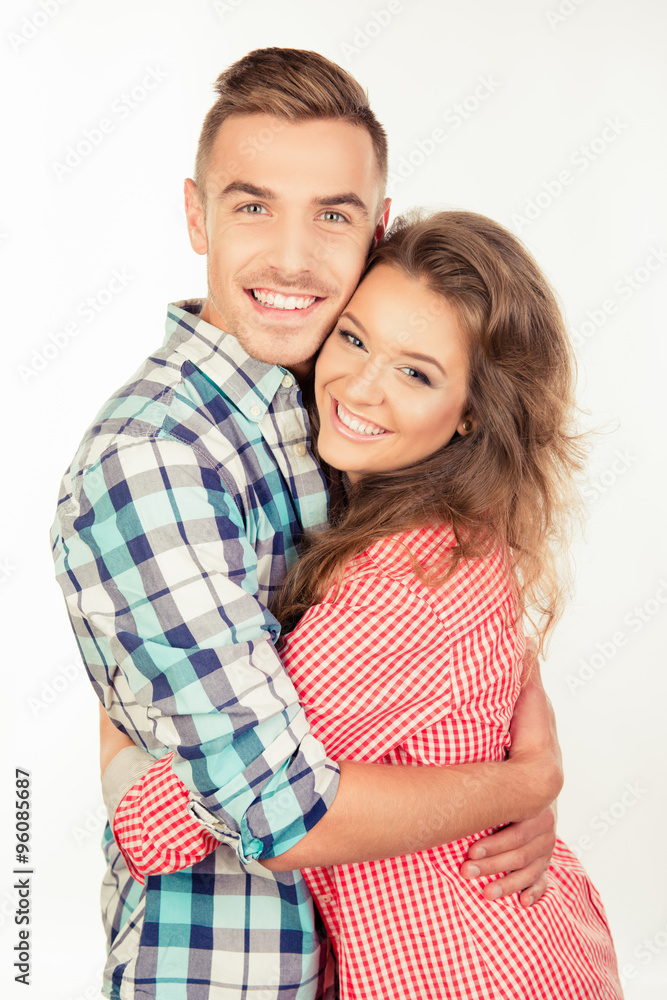 Cheerful couple in love embracing each other Cheerful couple in love embracing each other