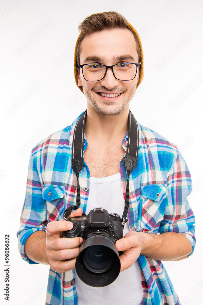 Young handsome photographer taking a photo Young handsome photographer taking a photo
