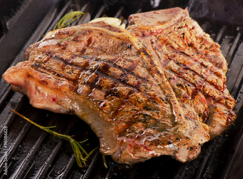 Grilled steak on a grill pan.