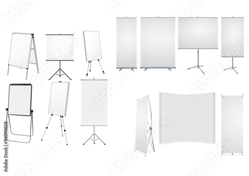 Large collection of roll up stands isolated on white background