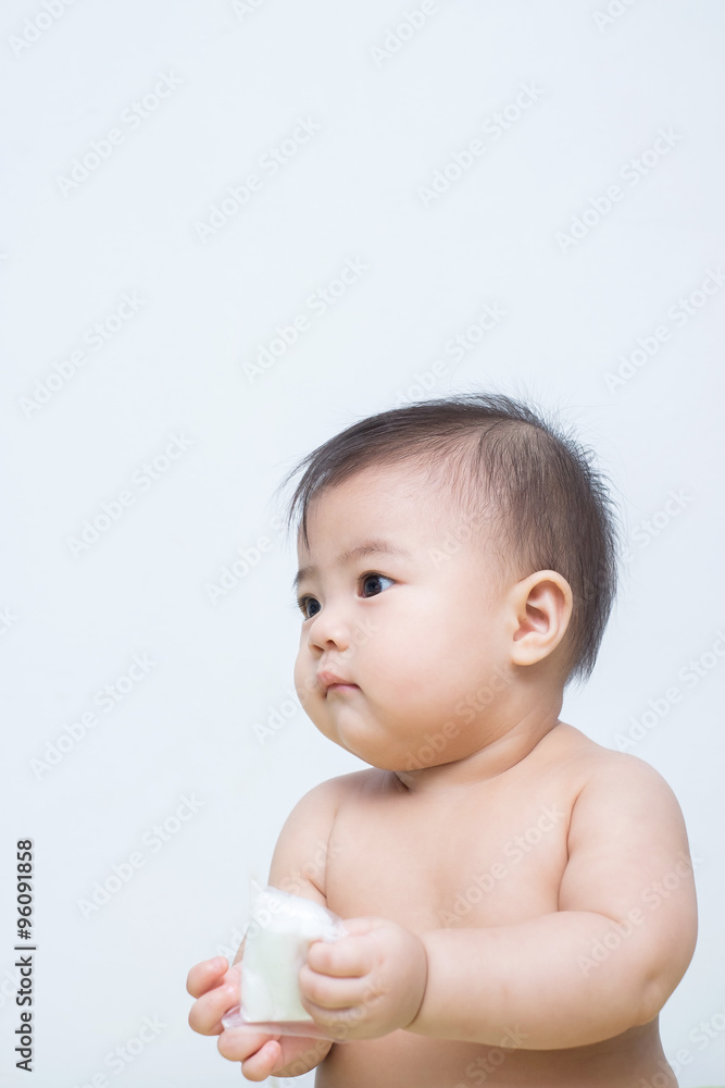 baby girl is holding Scottish fabric baby girl is holding Scottish fabric