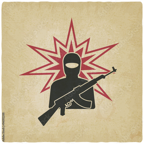 terrorist with gun old background
