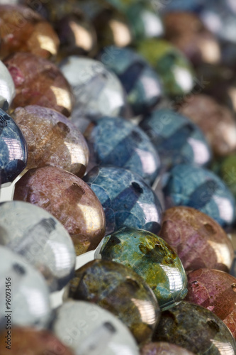 multicolored round beads in background pattern