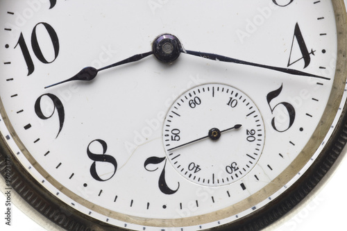 antique pocket watch isolated on white background