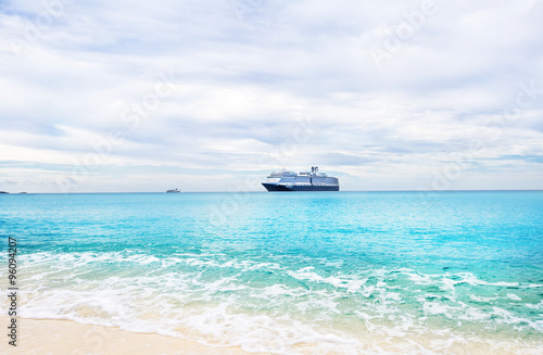 Cruise ship and tender on a light blue sea at Half Moon Cay in t © maylat