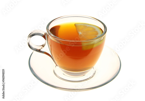 Tea in a glass cup with lemon slice 
