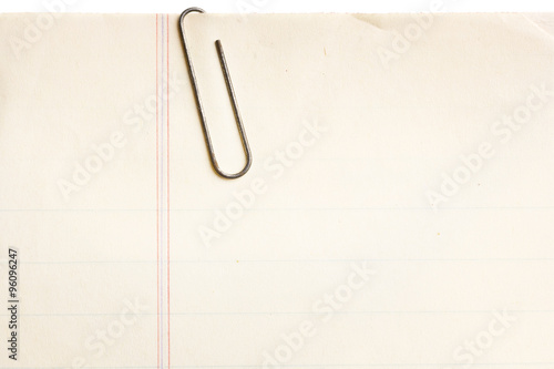 old paper with rusty paperclip