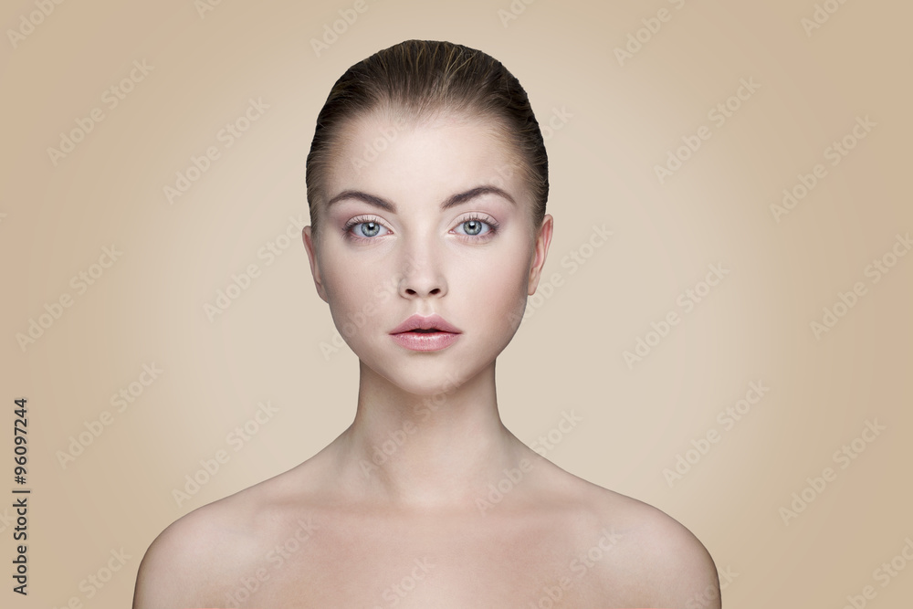 beautiful woman on cream background