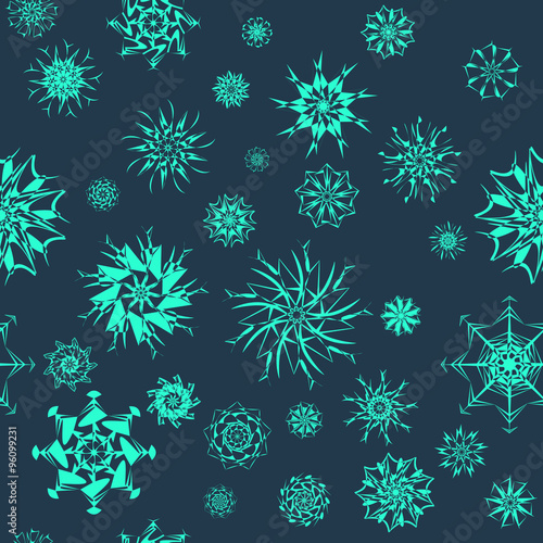 Elegant neon blue snowflakes of various styles isolated on dark blue background