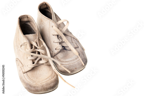 old baby shoes isolated on white background