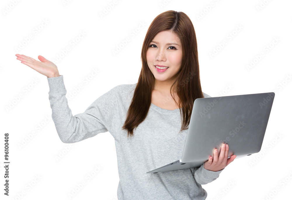 Woman hold with laptop computer and open hand palm Woman hold with laptop computer and open hand palm