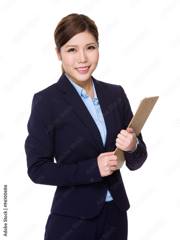 Asian Young Businesswoman hold with clipboard Asian Young Businesswoman hold with clipboard