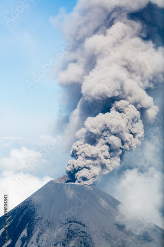 Billowing column of smoke and ash Karymskii photo