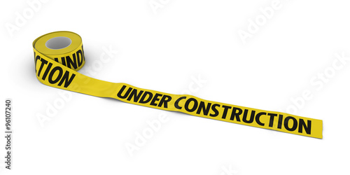 UNDER CONSTRUCTION Tape Roll unrolled across white floor