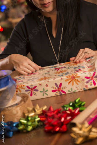 Woman Wrapping Christmas Gifts