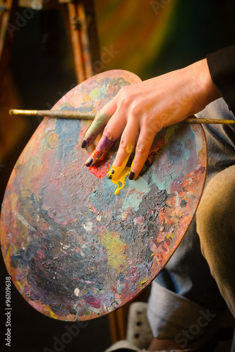 Brush in a painter's hand