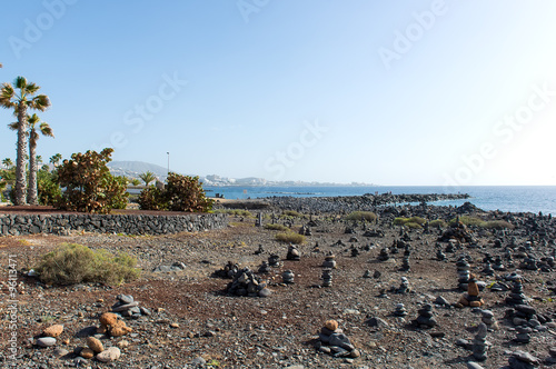 Art of stone balance, piles of stones on the beach. Tenerife