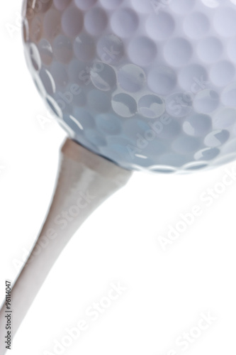 golf ball on tee isolated