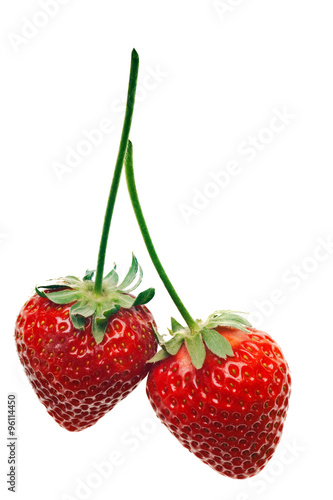 ripe red strawberries with stems and leaves isolated