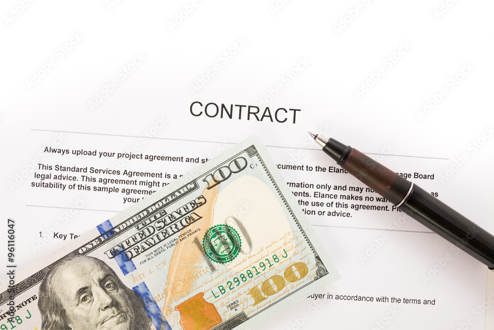 Pen on the contract papers and us dollars Pen on the contract papers and us dollars