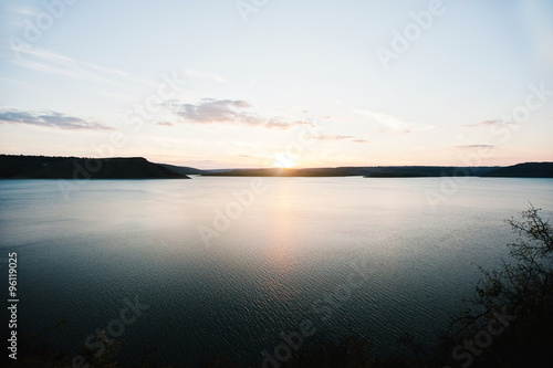 Sunset on river Dnister on reservoir Bakota  Ukraine