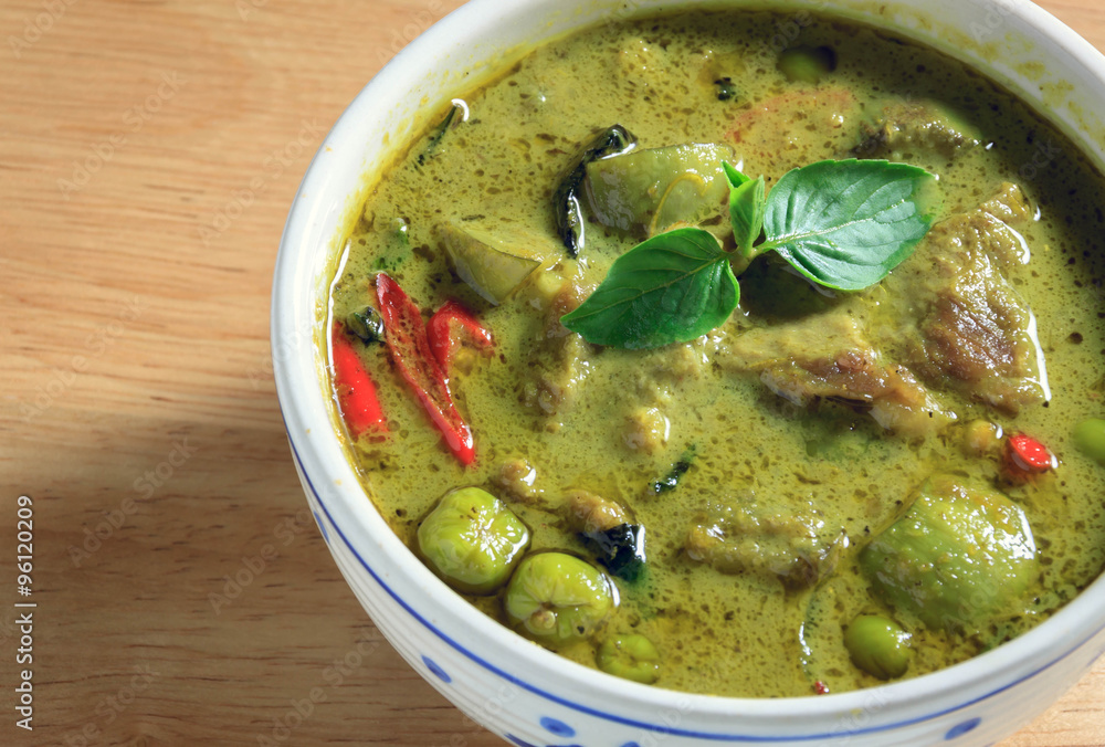 green curry wood background.