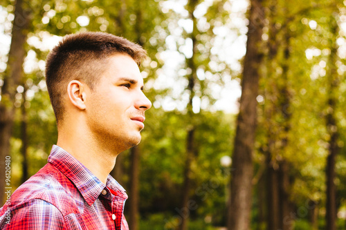 Portrait of a handsome man in the park