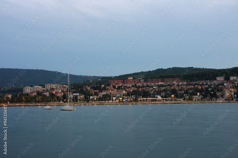 Residential area on coastline, city Koper in Slovenia in the eve