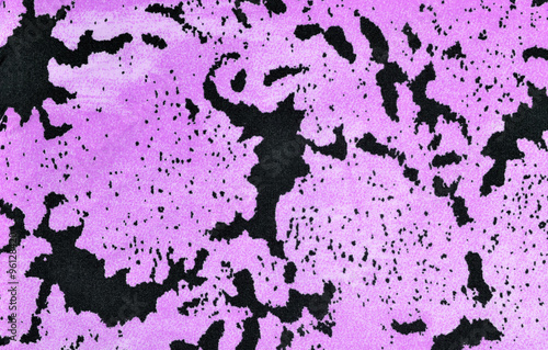 Abstract dots pattern on fabric. Pink black stained material as background.