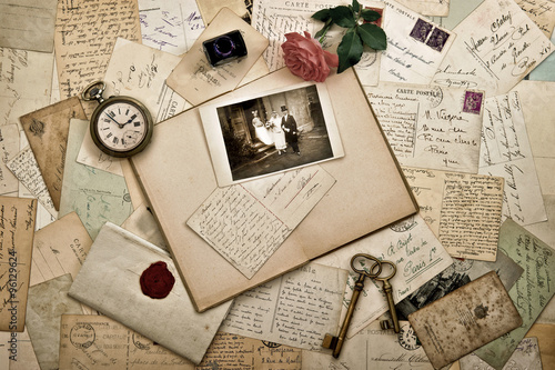 Old letters, photographs and postcards. Wedding background