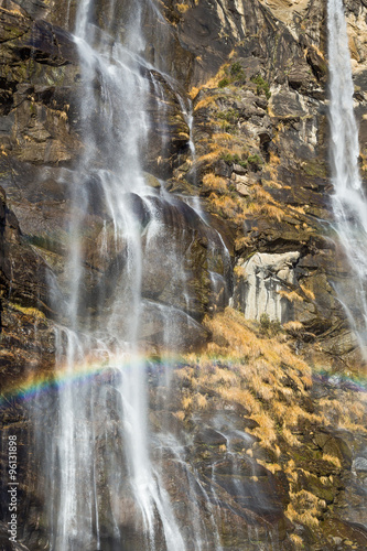 Beautiful waterfall in the forest with rainbow