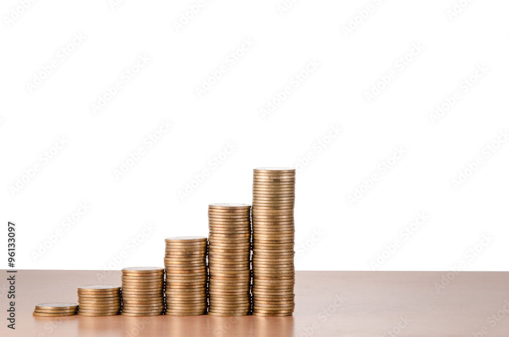 growing gold stack of coins on table isolated on white backgroun growing gold stack of coins on table isolated on white backgroun