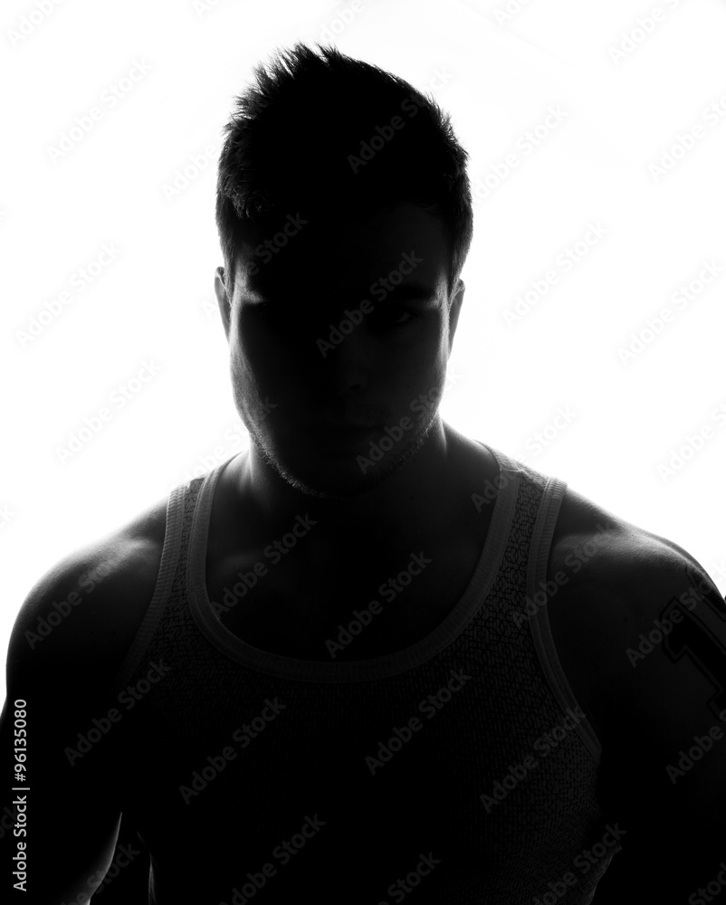 Hidden face in the shadow.male silhouette. Hidden face in the shadow.male silhouette.