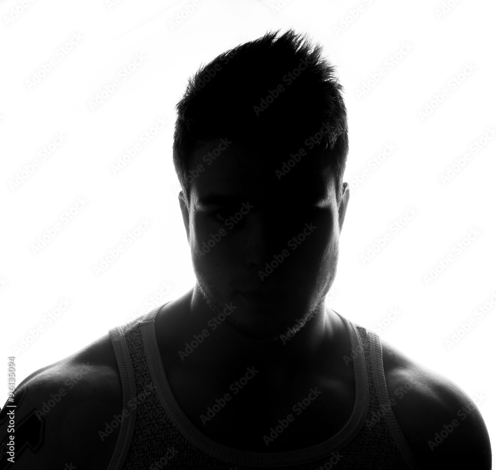Hidden face in the shadow.male silhouette. Hidden face in the shadow.male silhouette.