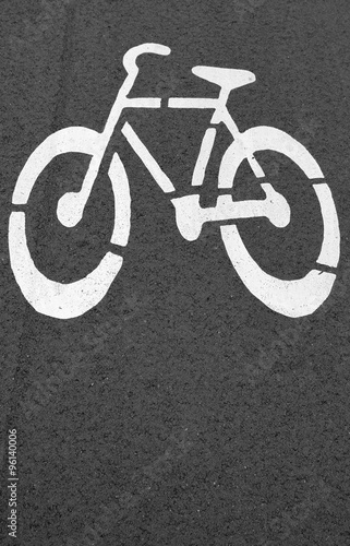 Bike lane. Sign for bicycle painted on the asphalt. 