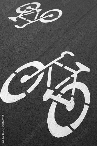 Bike lane. Sign for bicycle painted on the asphalt. 