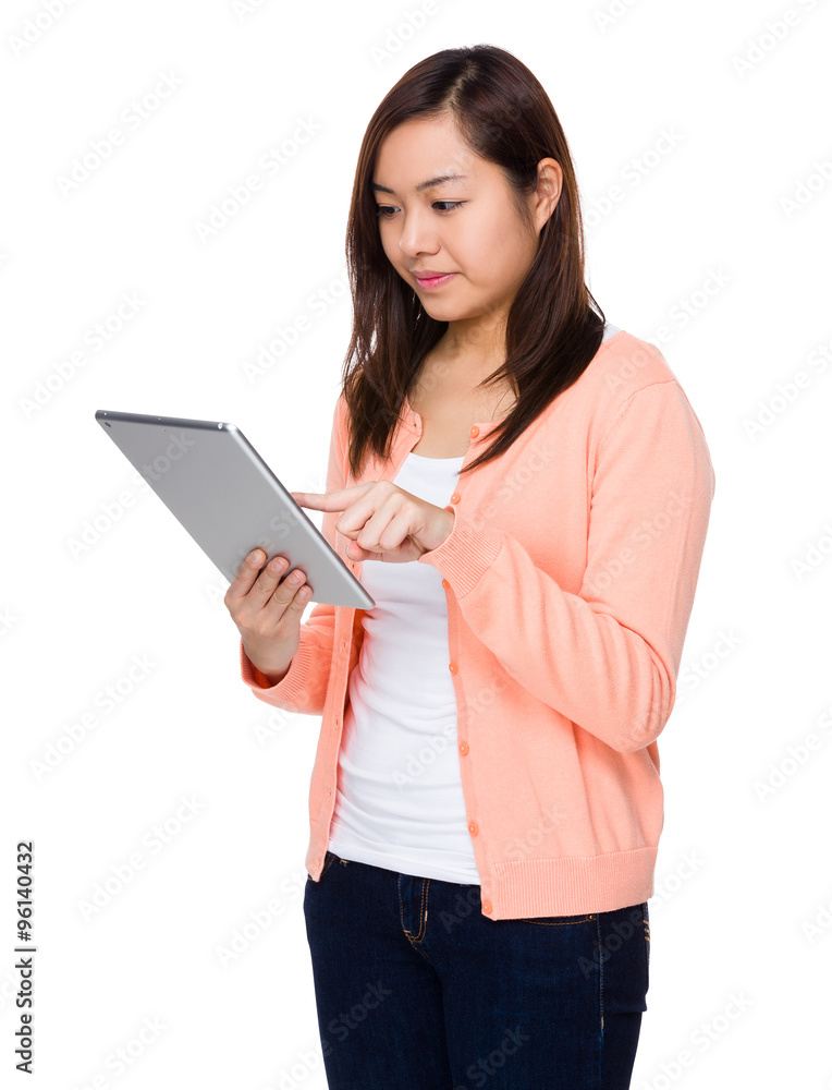 Asian Young Woman use of the tablet computer Asian Young Woman use of the tablet computer