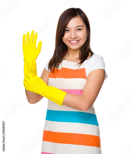 Asian Housewife wear with plastic gloves