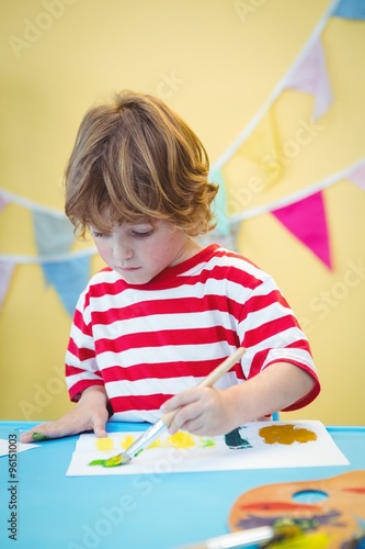 Child painting a beautiful picture