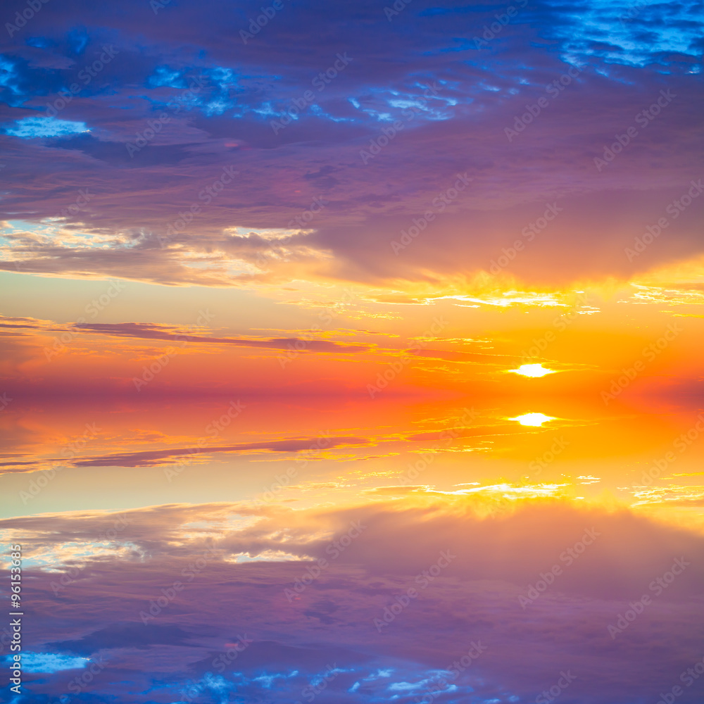Beautiful colorful sunset over mediterranean sea is reflected in
