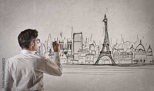Man drawing a picture of Paris © olly