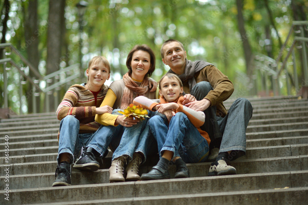 Fototapeta premium family walking in the park 