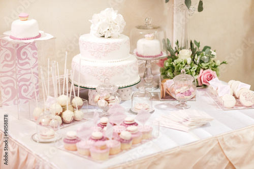 sweet table at the wedding. wedding cake