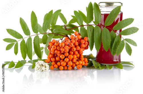 Εκτύπωση καμβά Orange rowanberry with jar of juice isolated on white background